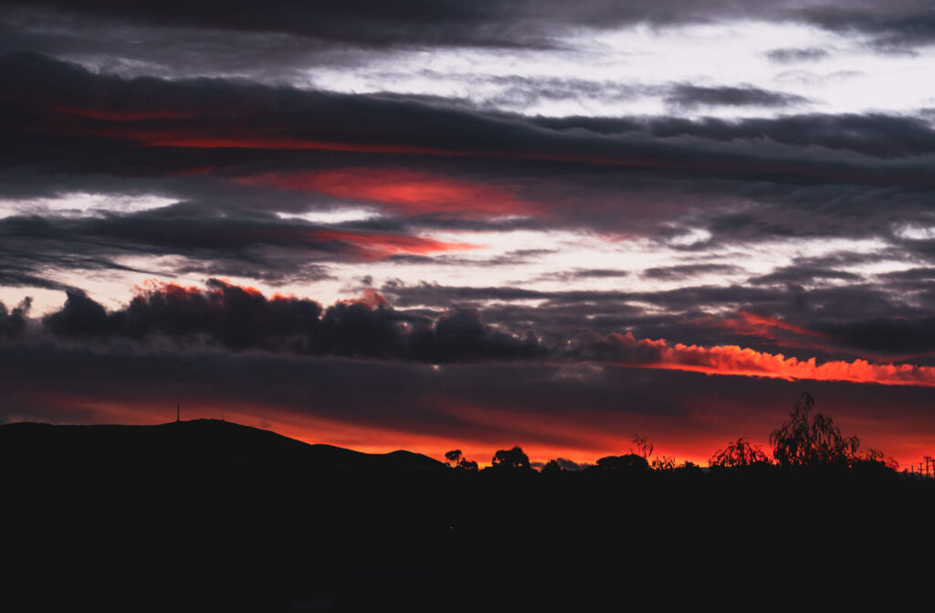 A striking sunset above Mount Wellington (kunanyi) over Hobart, Tasmania.